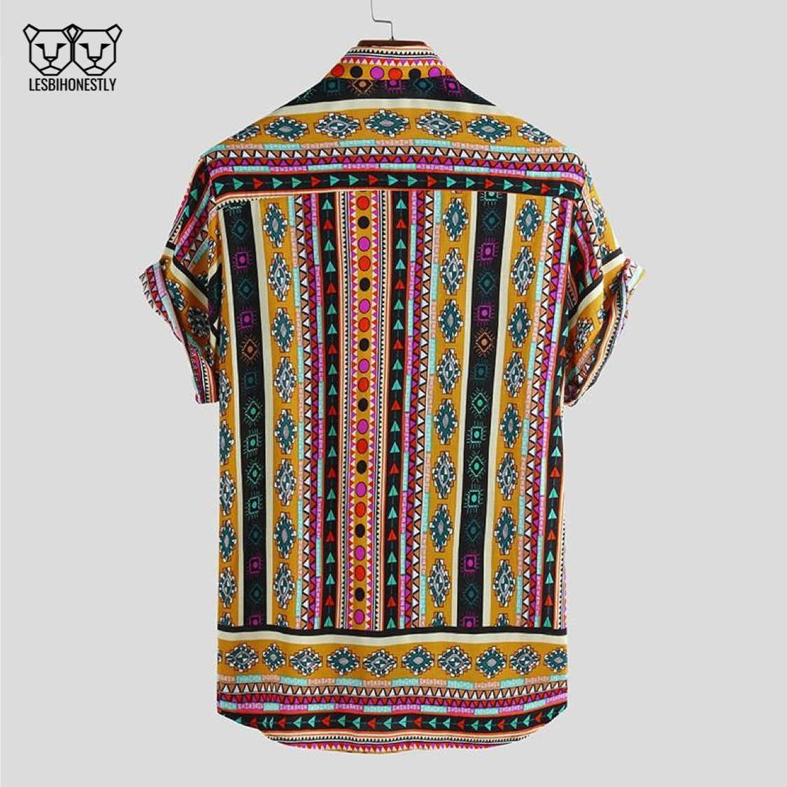 The back of a button up shirt with a yellow, pink and black southwestern print